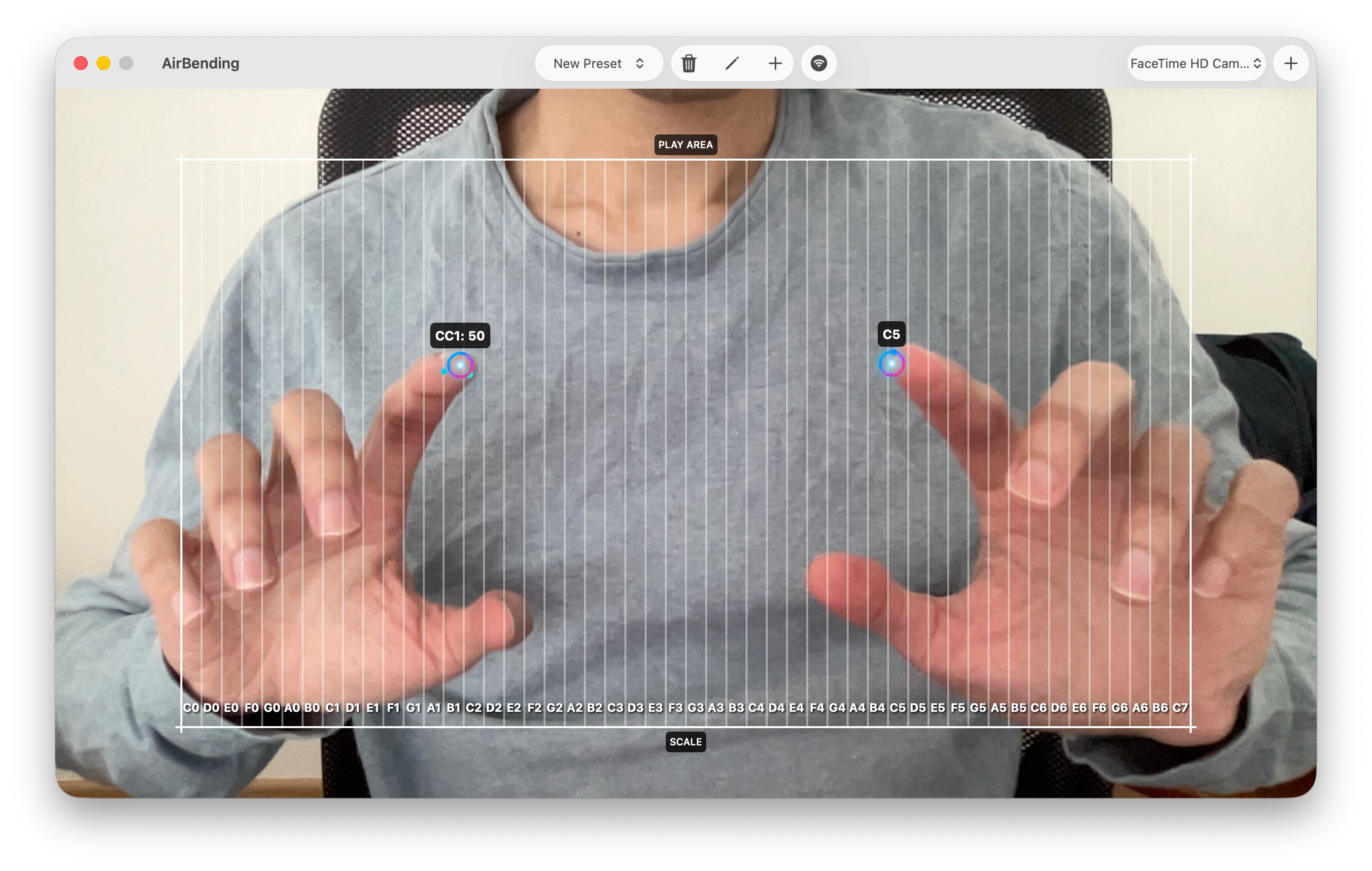Mac main window — camera view with hand tracking dots, top toolbar with camera picker, preset selector, and camera buttons